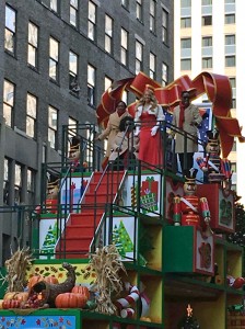 3D calendar on 3 story float kicks off the holiday season w/ showcase of merry scenes behind each day. Mariah Carey Celebrates partnership w/ Hallmark Channel by performing on their float.