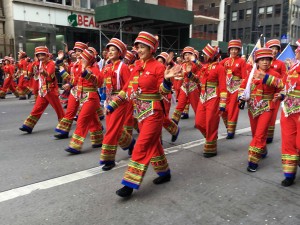 a dance group of 70 Chinese and American performers dressed in Chinese traditional costumes. Chinese costumed nationals representing Kunming,